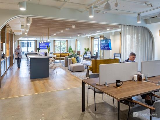 Working at ALX Community Atrium at Alexandria